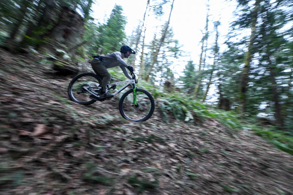 Product testing the bike in the PNW